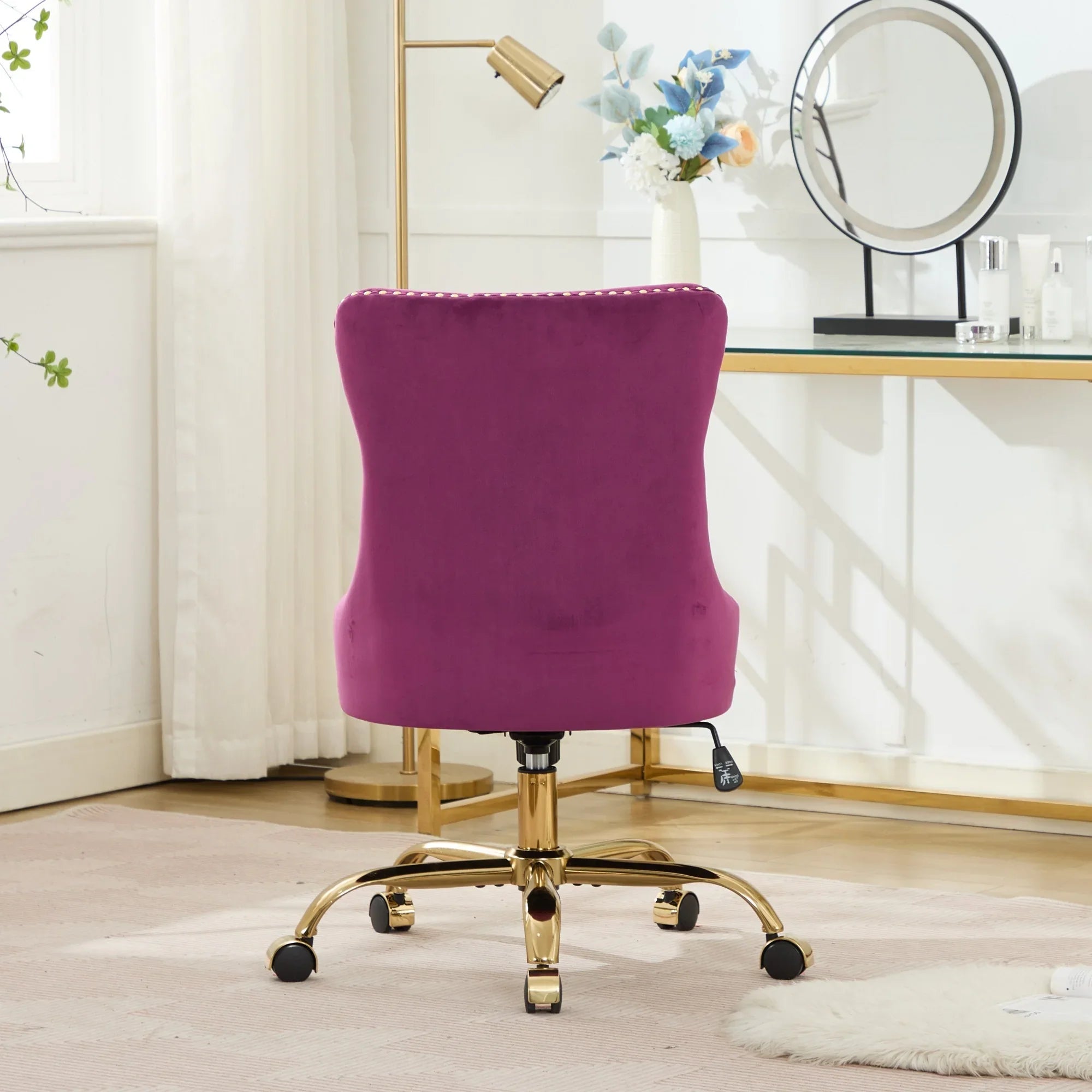 Luxurious purple velvet tufted office chair with gold metal base, nailhead trim, and deep wide seat from Platinum-Level Office Chairs.