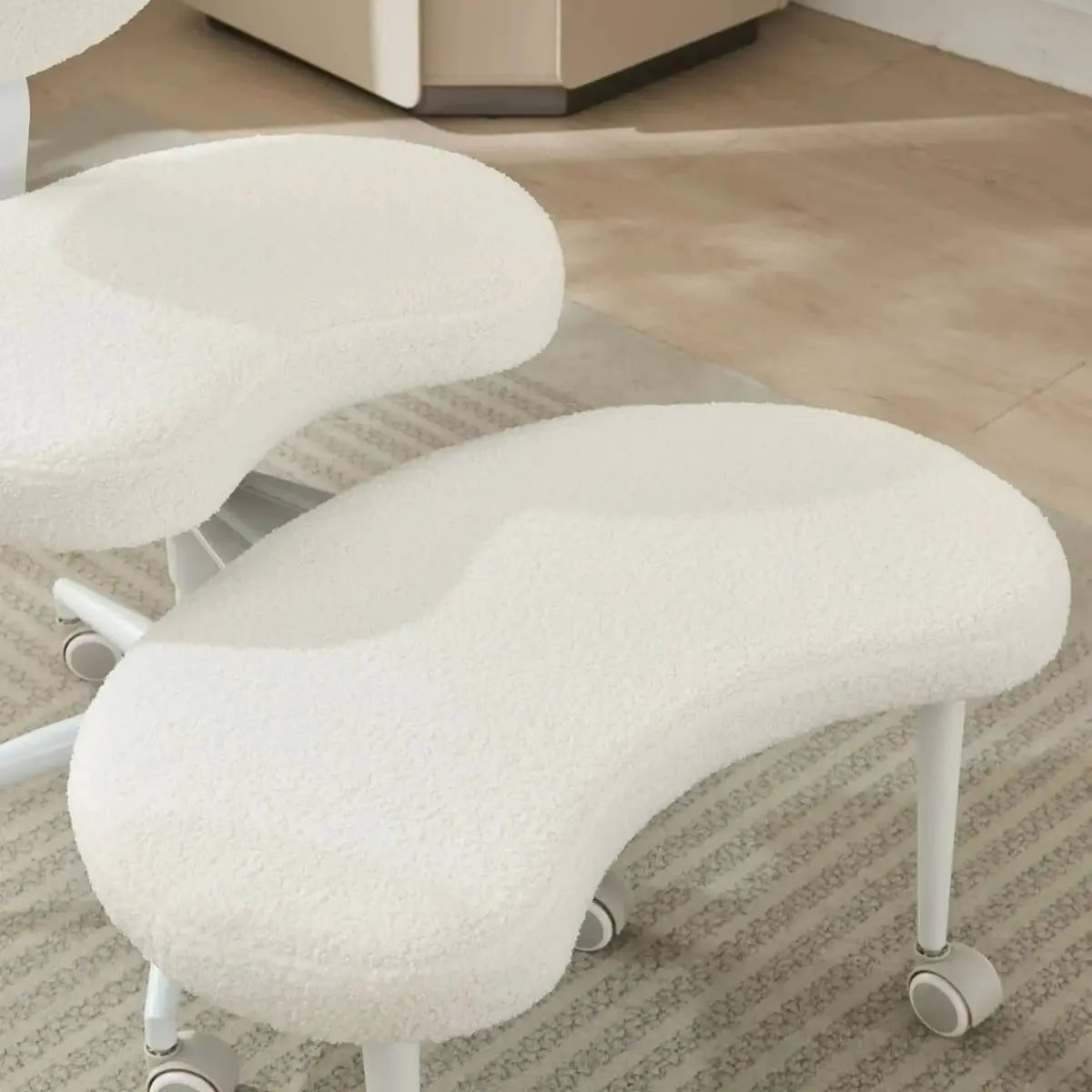 Ivory meditation chair with wheels for ADHD, cross-legged design, by Platinum-Level Office Chairs, ideal for comfortable seated meditation.