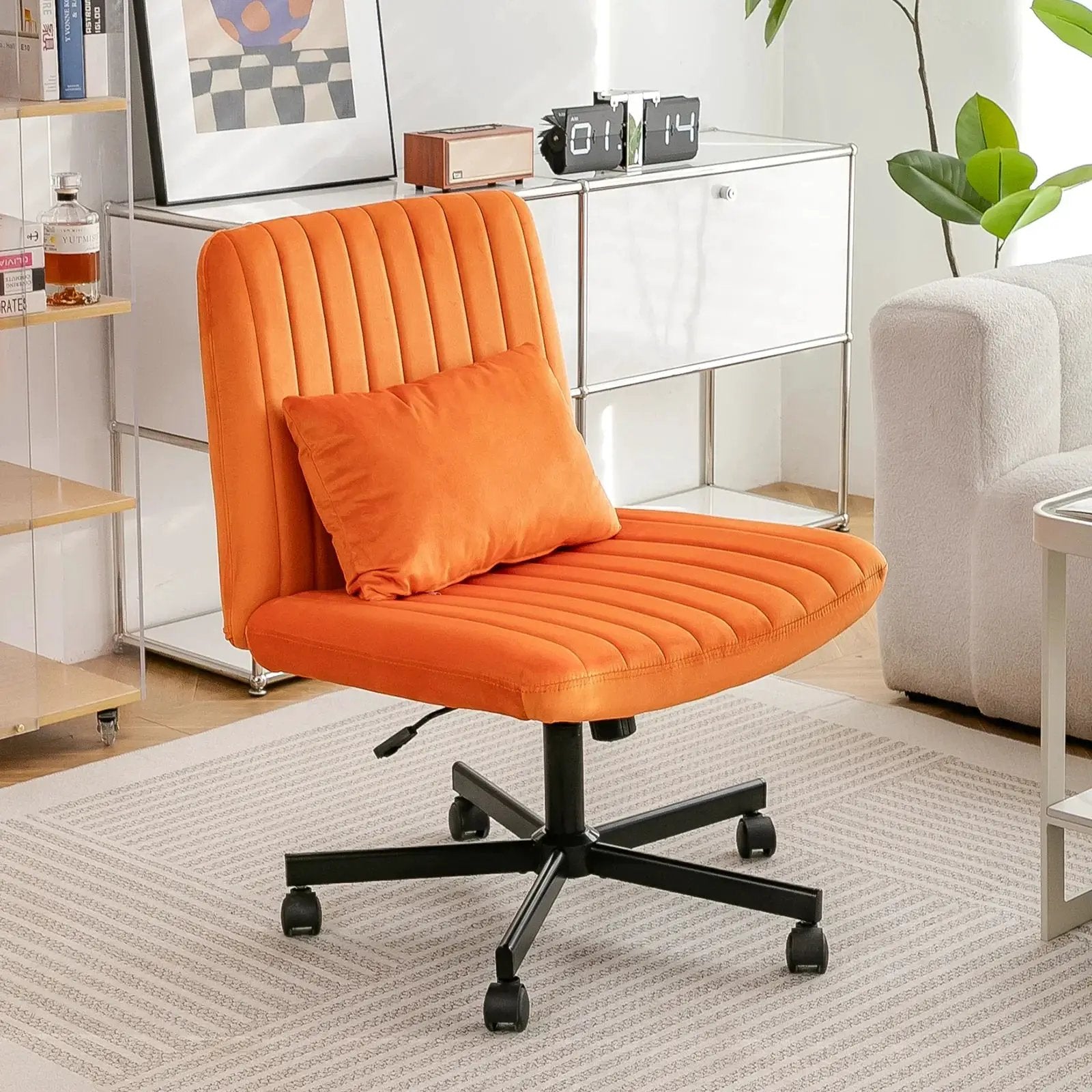 Premium orange velvet armless office chair with wheels by Platinum-Level Office Chairs, featuring a criss-cross design and modern style