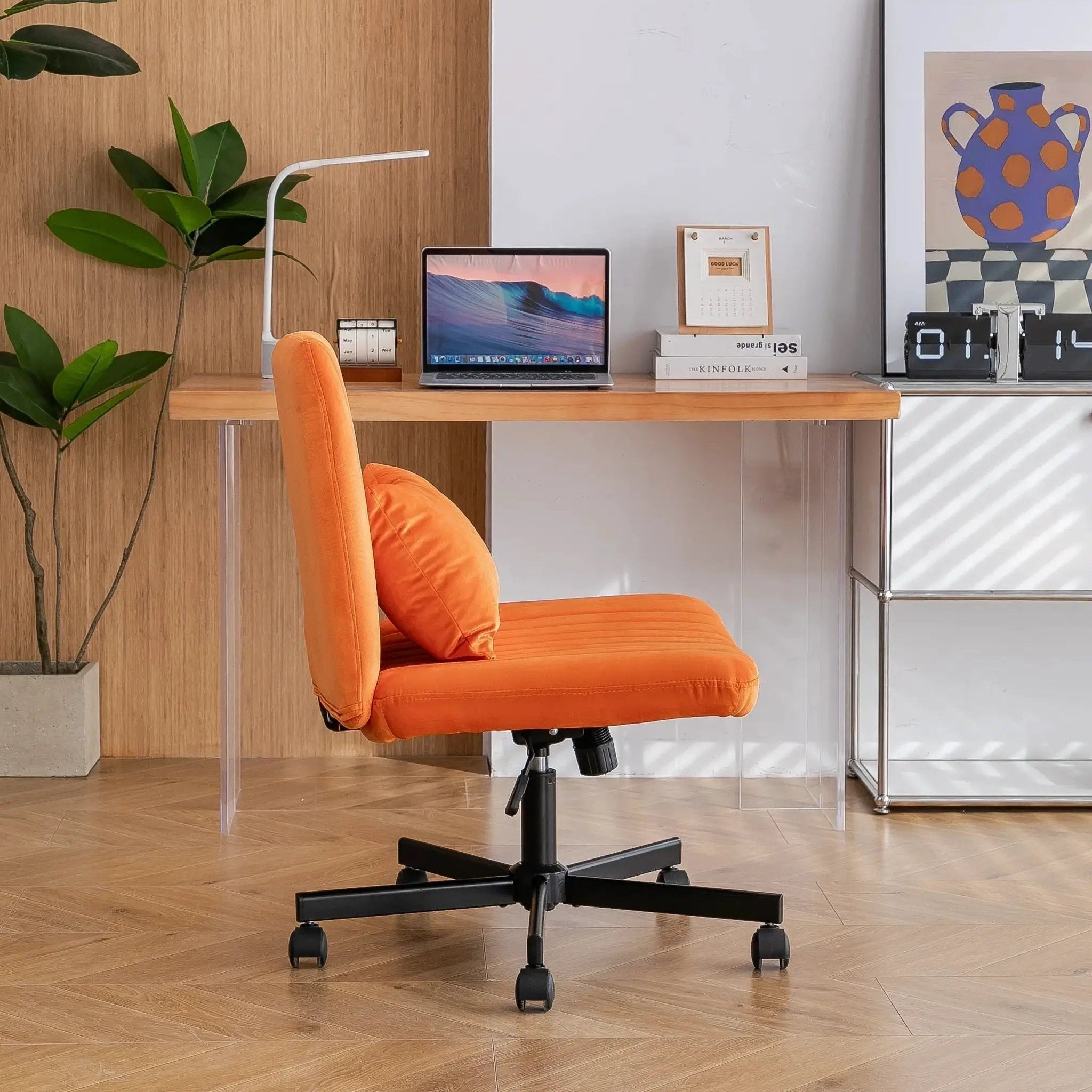 Premium orange velvet armless office chair with wheels, featuring a criss-cross design by Platinum-Level Office Chairs