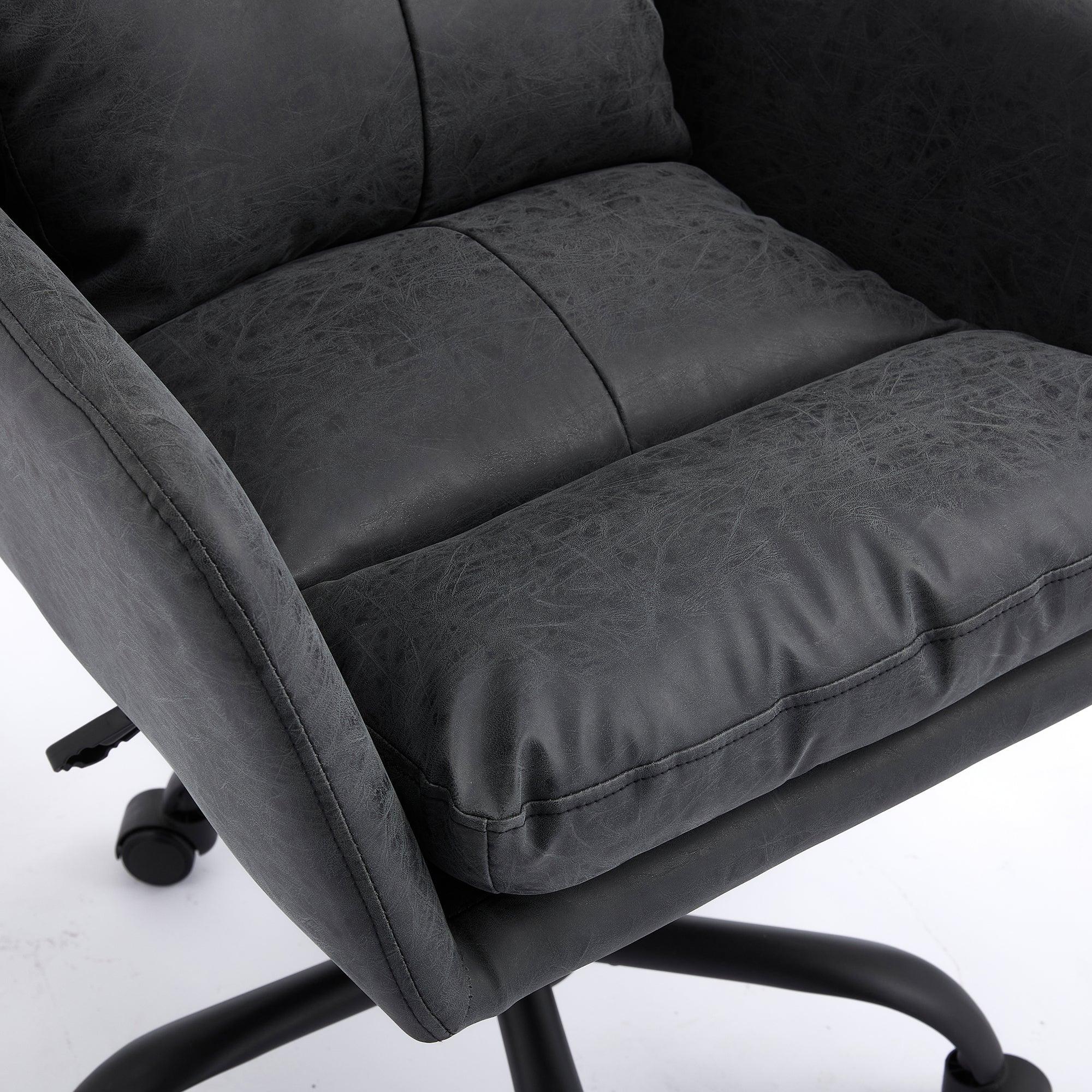 Black leather TY adjustable ergonomic office chair with durable metal frame, designed for comfort and support.