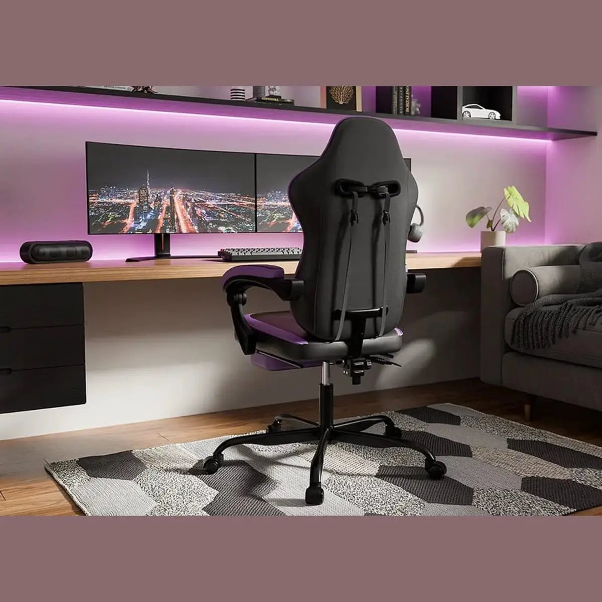 Ergonomic gaming chair by Platinum-Level Office Chairs with built-in footrest and massage function, black and gray upholstery.