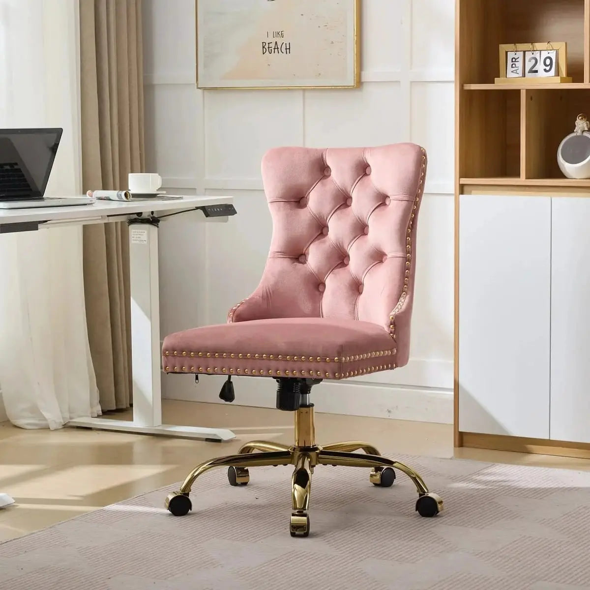 Velvet pink office chair with tufted upholstery, golden base, and adjustable swivel for stylish comfort by Platinum-Level Office Chairs.