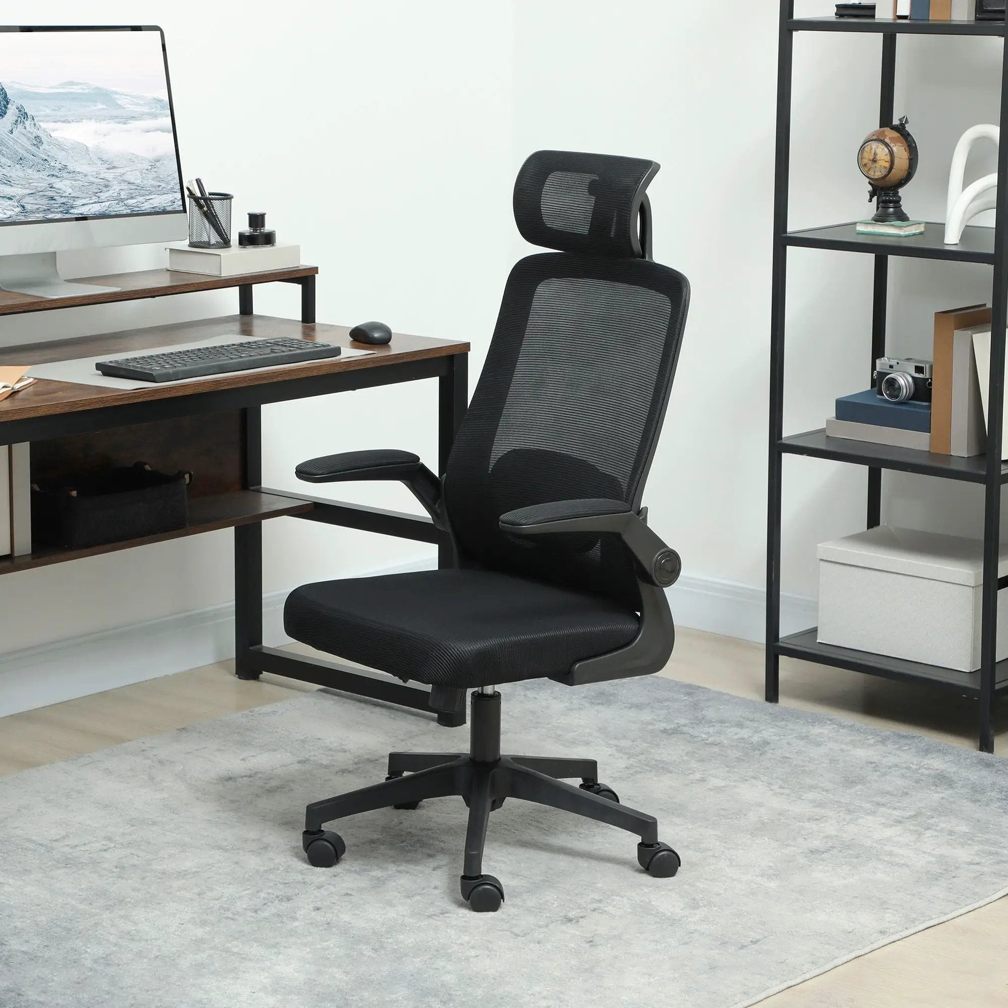 Black ergonomic mesh office chair by Platinum-Level Office Chairs with adjustable lumbar support and headrest for comfort.