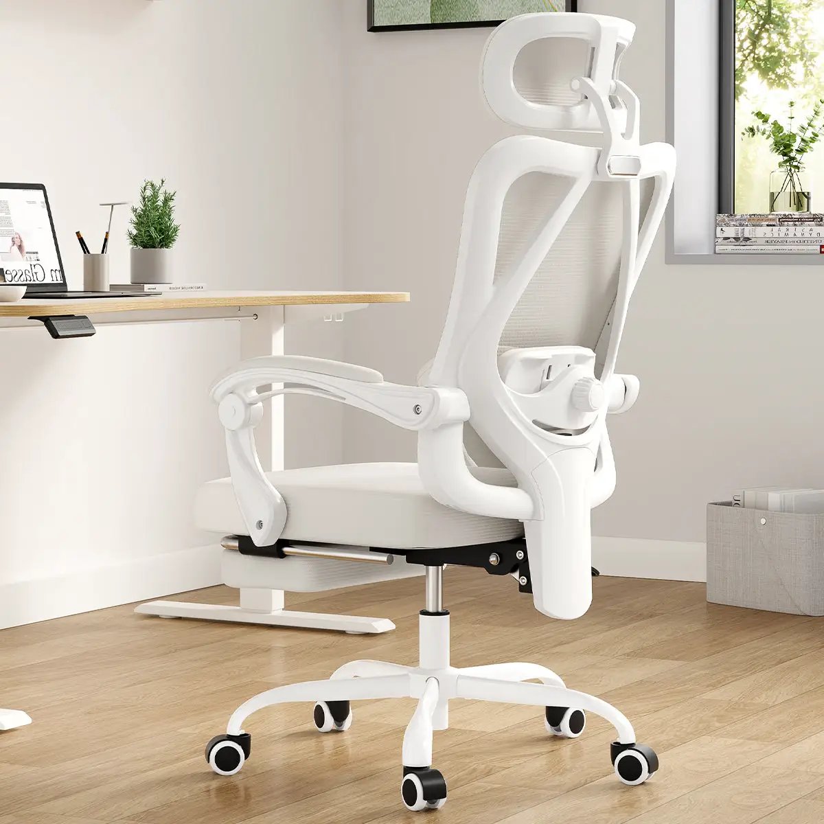 White ergonomic office chair with footrest and headrest from Platinum-Level Office Chairs, featuring mesh design and adjustable features.