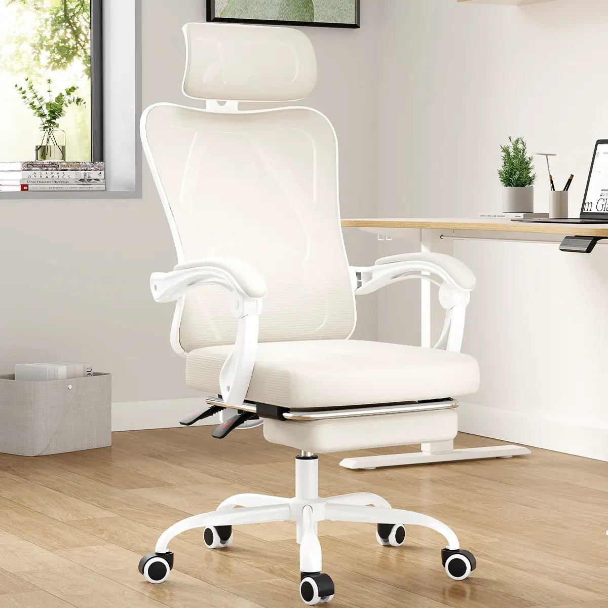 White ergonomic office chair with footrest and headrest by Platinum-Level Office Chairs, featuring mesh design and adjustable support.