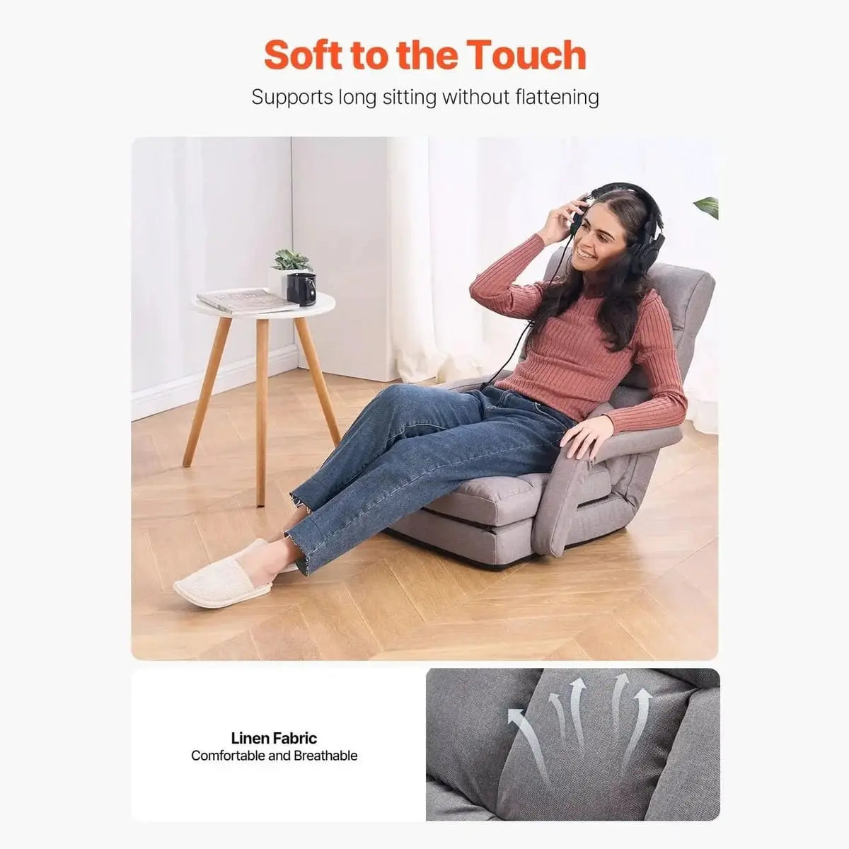 Grey folding floor chair by Platinum-Level Office Chairs, adjustable for gaming and reading, with a comfortable cushioned seat.