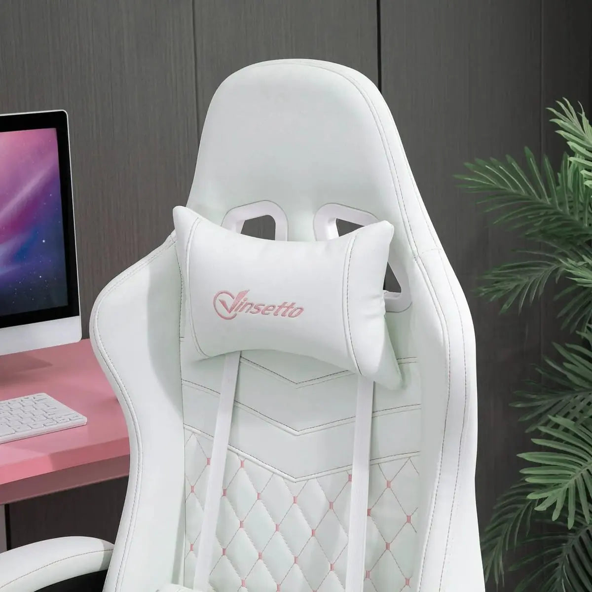 White ergonomic PU leather gaming chair by Platinum-Level Office Chairs with retractable footrest, adjustable height, and high back.