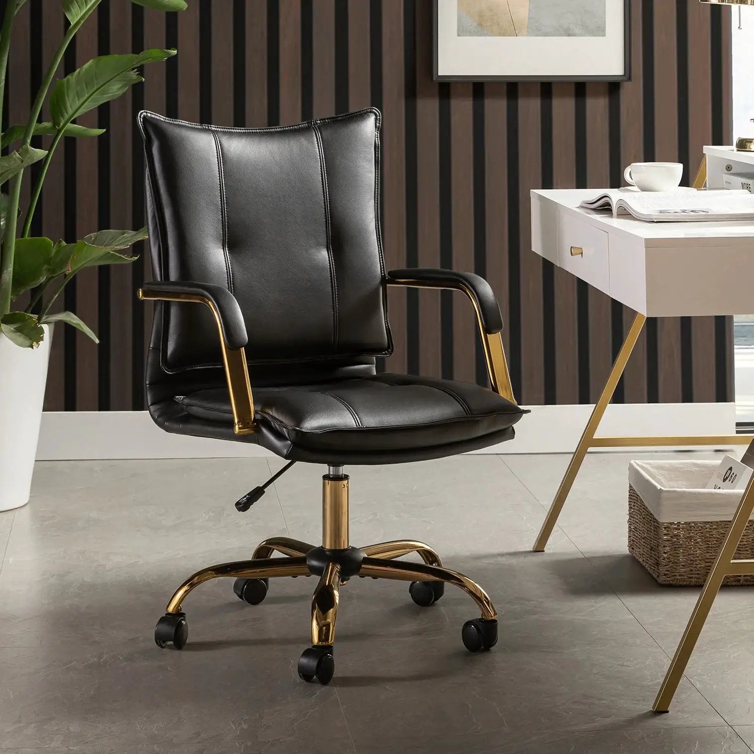 Modern black faux leather office chair with gold base, ergonomic swivel design, and adjustable height for professional home office use.