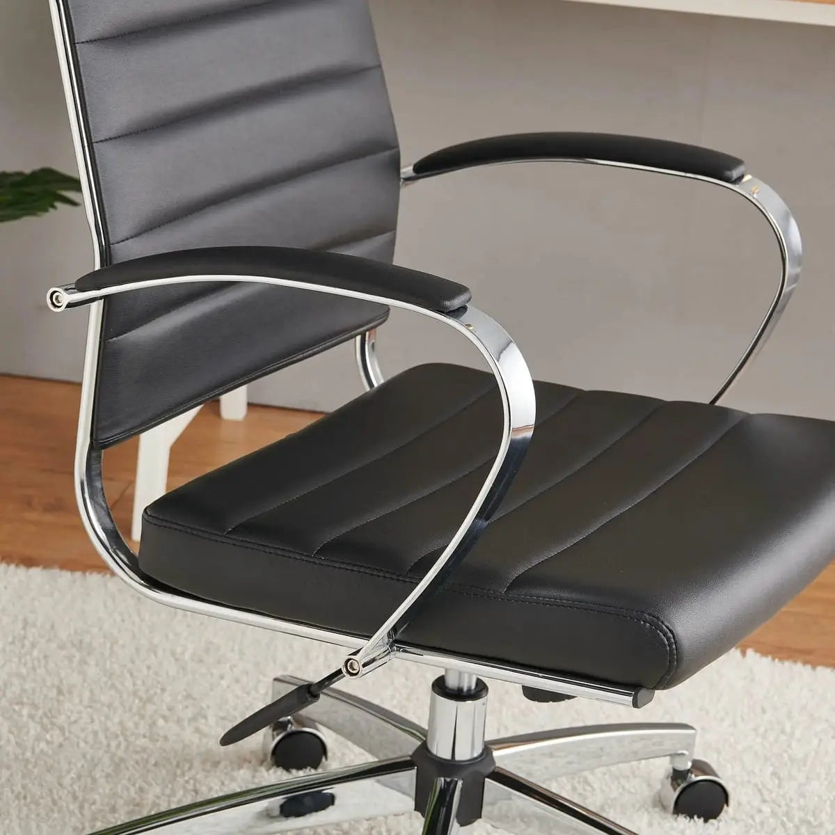 Modern ergonomic faux leather office chair by Platinum-Level Office Chairs, orange with a sleek design for home or office use.