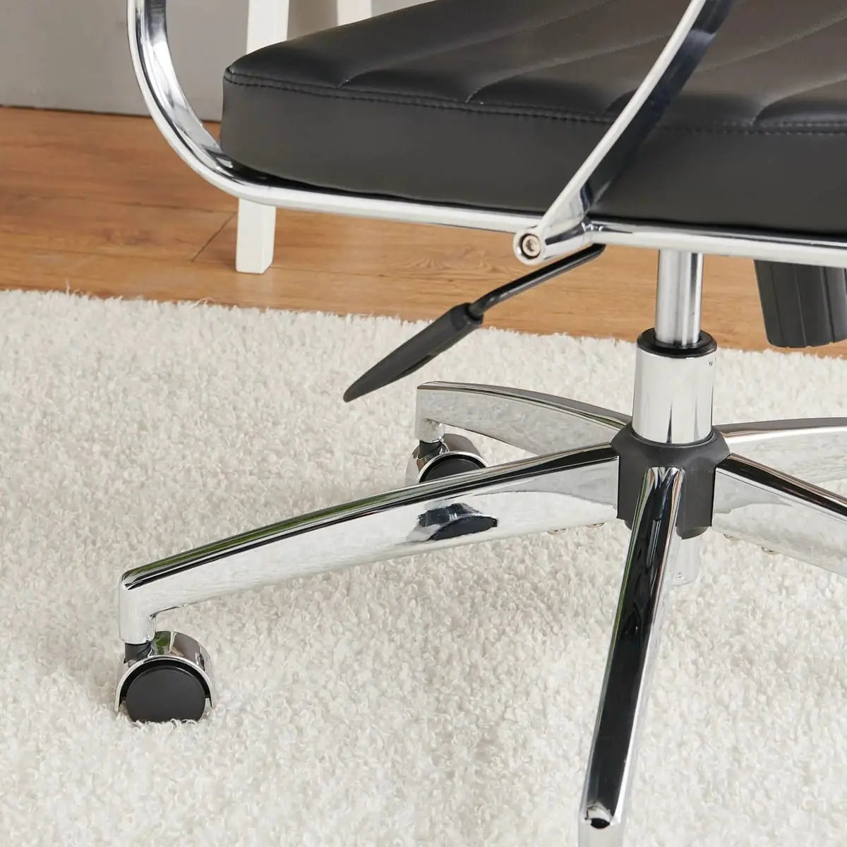 Modern orange ergonomic faux leather home office chair by Platinum-Level Office Chairs with adjustable armrests and a sleek design.