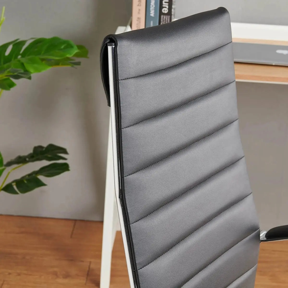 Modern ergonomic faux leather office chair by Platinum-Level Office Chairs, orange color, designed for home or office use.