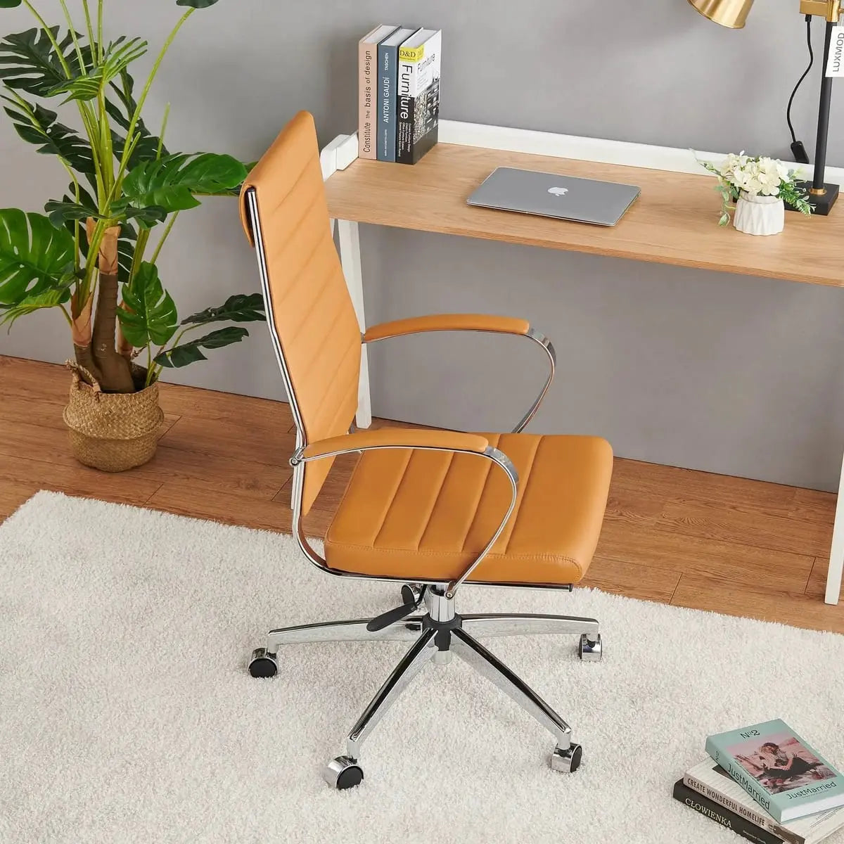 Modern ergonomic faux leather office chair by Platinum-Level Office Chairs with orange upholstery and adjustable features for home or office.