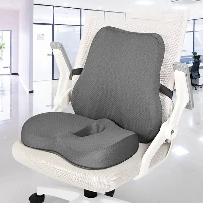 Blue ergonomic memory foam lumbar support and seat cushion set for office chairs, designed for back comfort and improved posture.