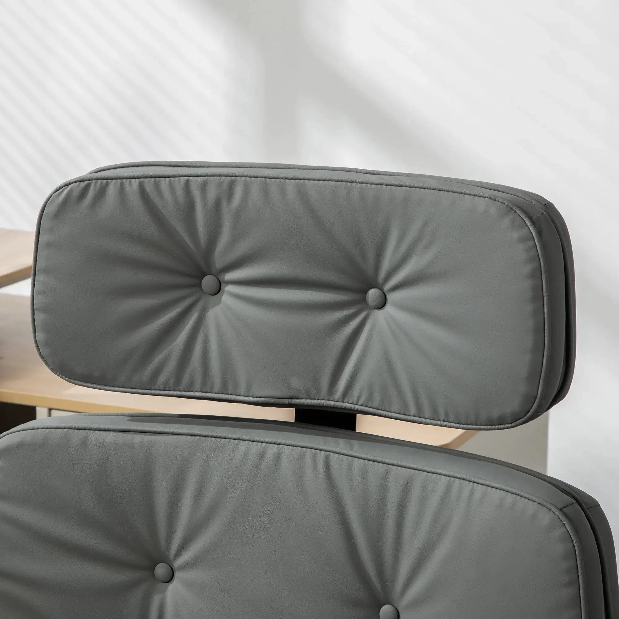 Modern platinum-level office chair featuring a criss-cross PU design, adjustable armrests with 6 gears, and rolling wheels.