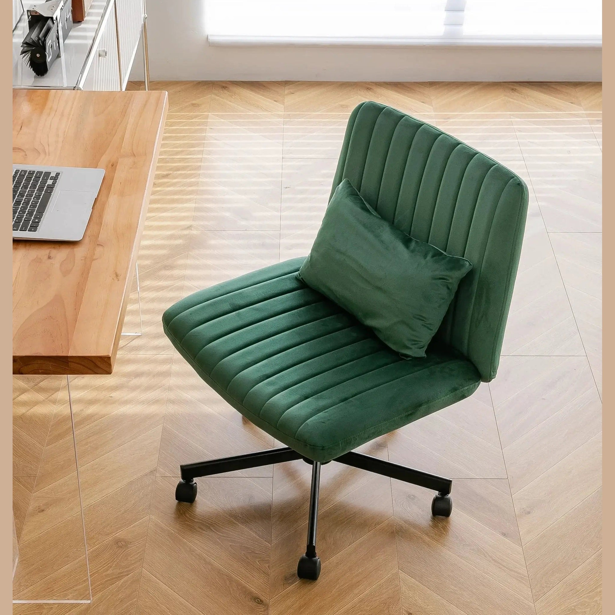 Green velvet criss-cross armless office chair with wheels, ergonomic design by Platinum-Level Office Chairs.
