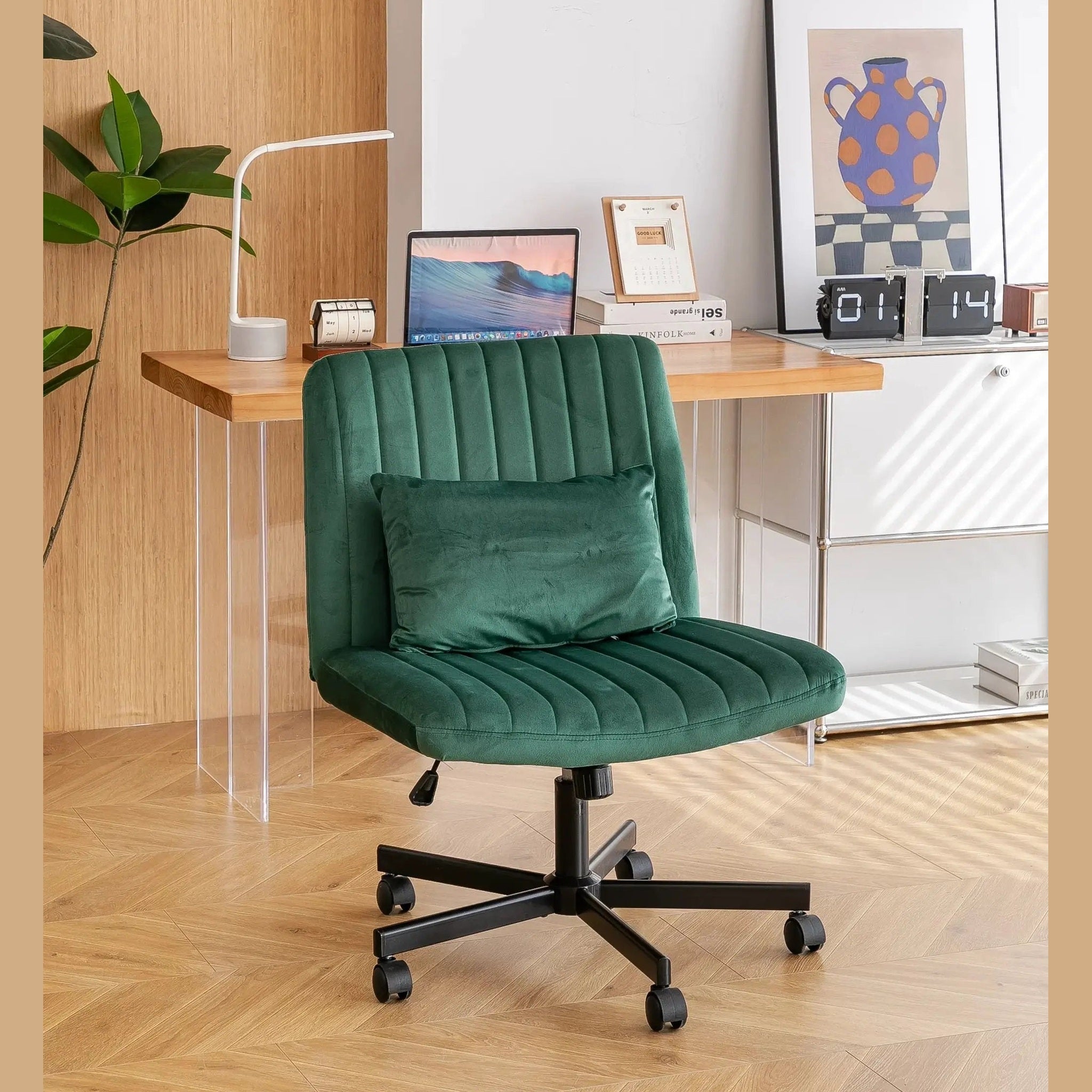 Green velvet criss-cross armless office chair with wheels, ergonomic design by Platinum-Level Office Chairs.