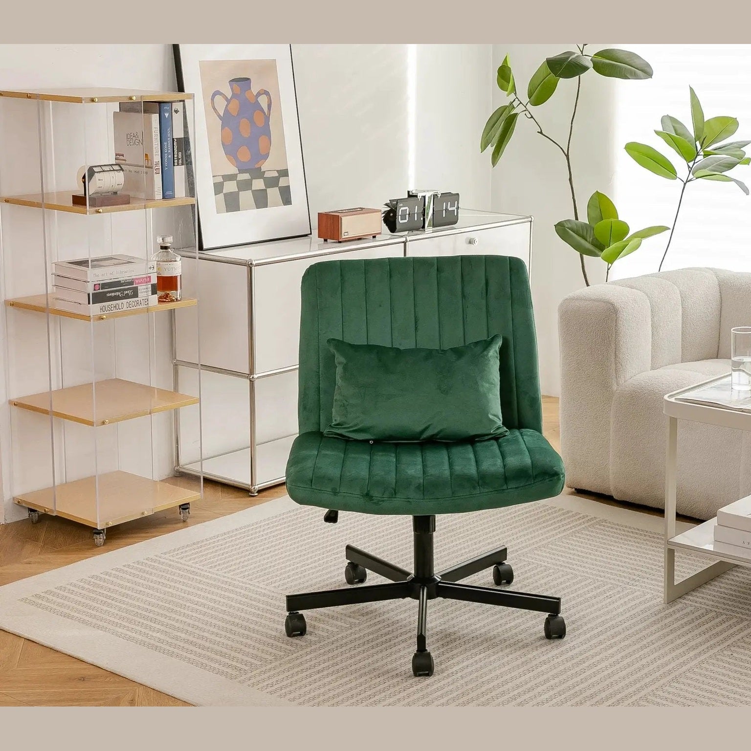 Green velvet armless office chair with criss-cross design, wheels, and ergonomic support from Platinum-Level Office Chairs.