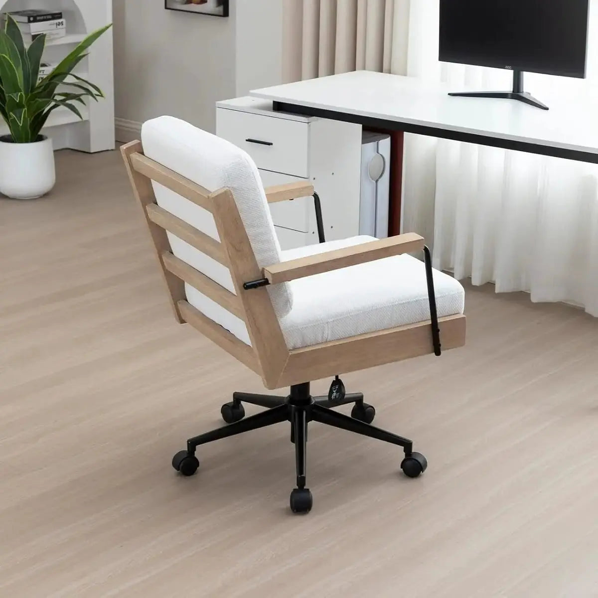 White vintage farmhouse-style wood desk chair with cushioned seat and backrest, ideal for home office comfort.